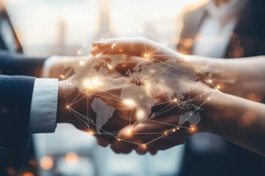 Global business partnership handshake representing digital transformation collaboration